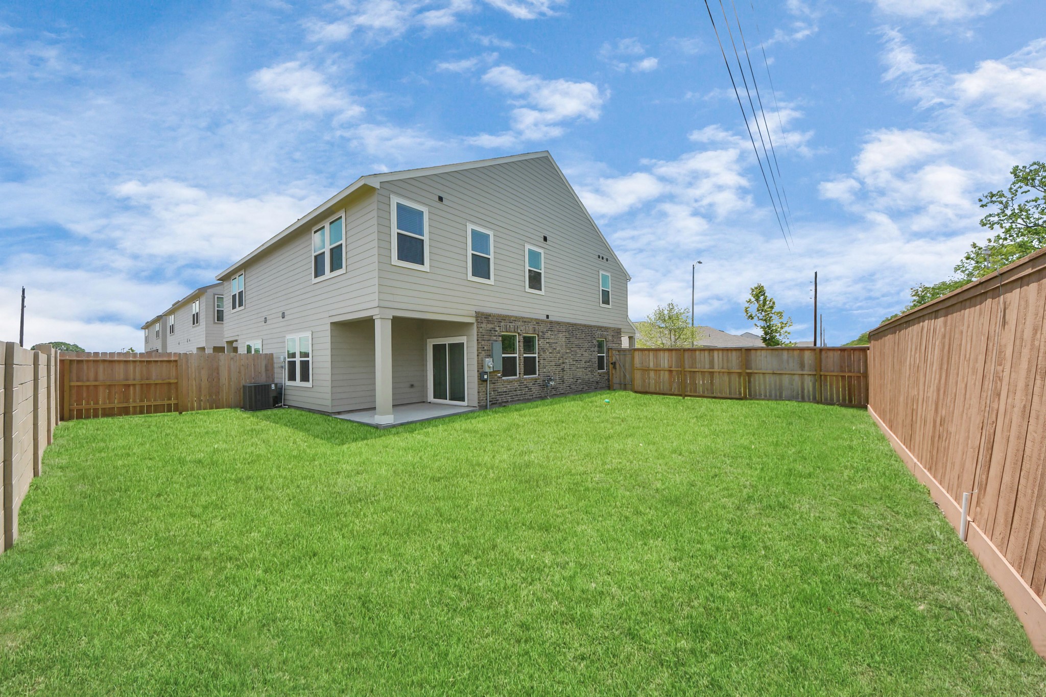 10303 Rose Mar Drive, Unit A Rosharon, TX 77583 - Photo 3 of 49 a view of a house with backyard and garden