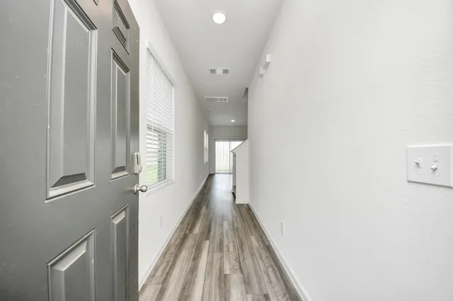 a black and white photo of a living room