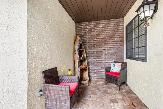 a backyard of a house with seating space