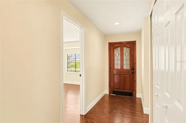 a view of hallway with windows