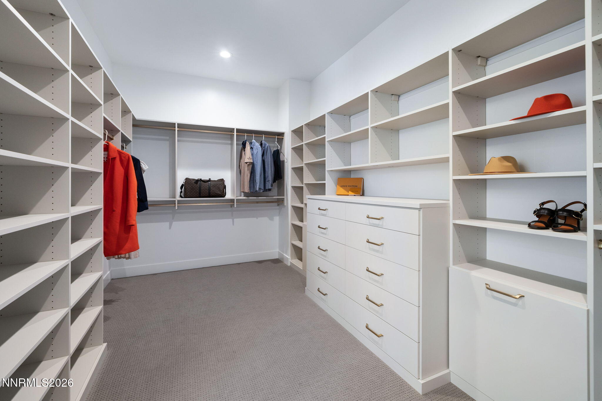5406 Side Saddle Trail Reno, NV 89511 - Photo 25 of 39 a view of walk in closet with clothes and shoes