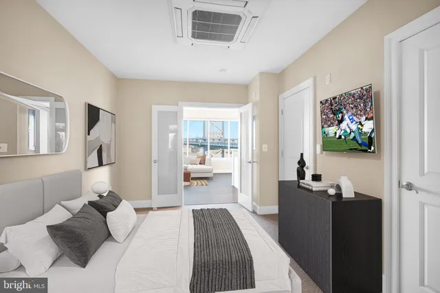 a bedroom with a bed and furniture