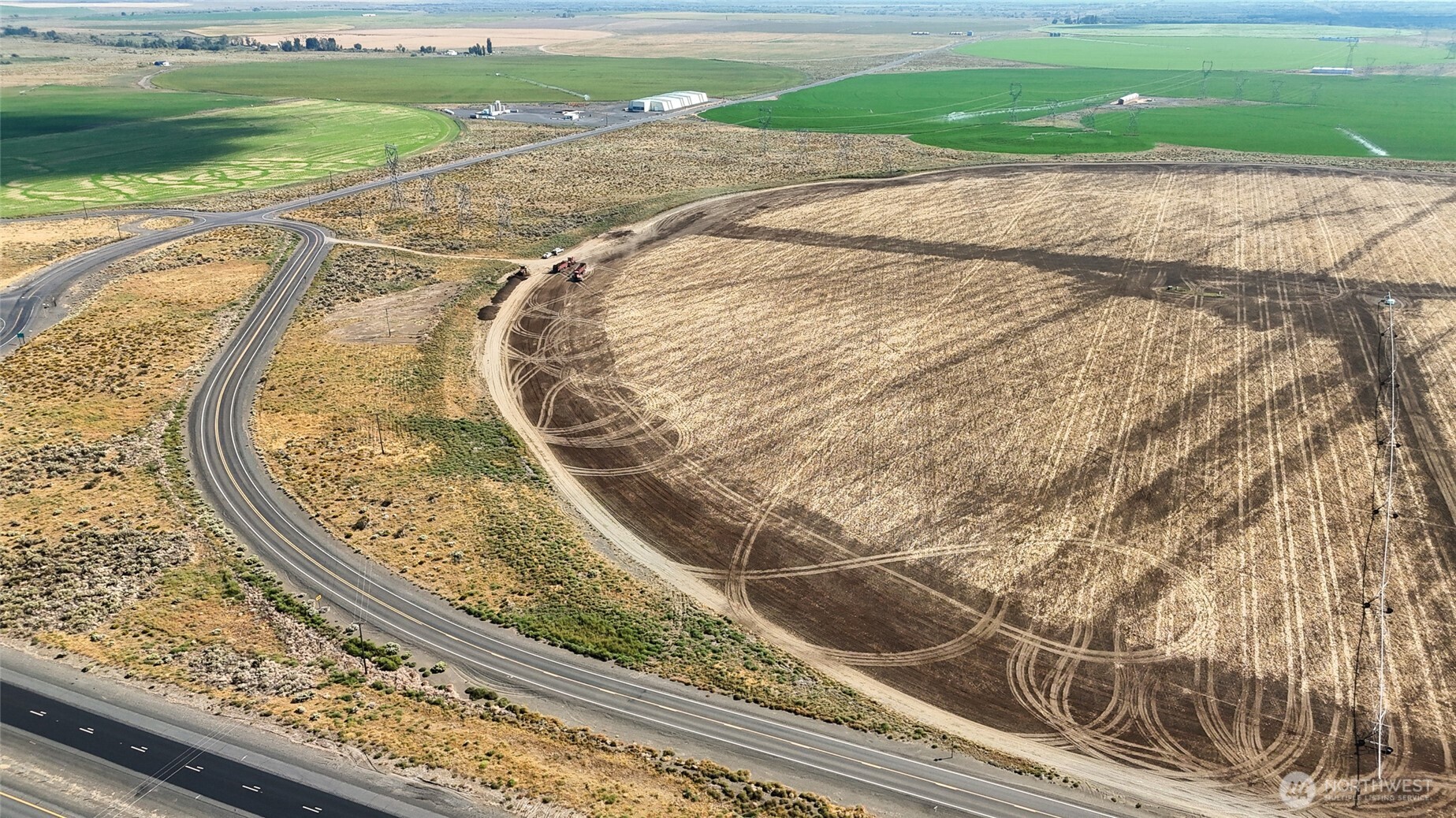 0 South Frontage Road Northwest Moses Lake, WA 98837 - Photo 6 of 8 a view of a swimming pool with a yard and wooden fence