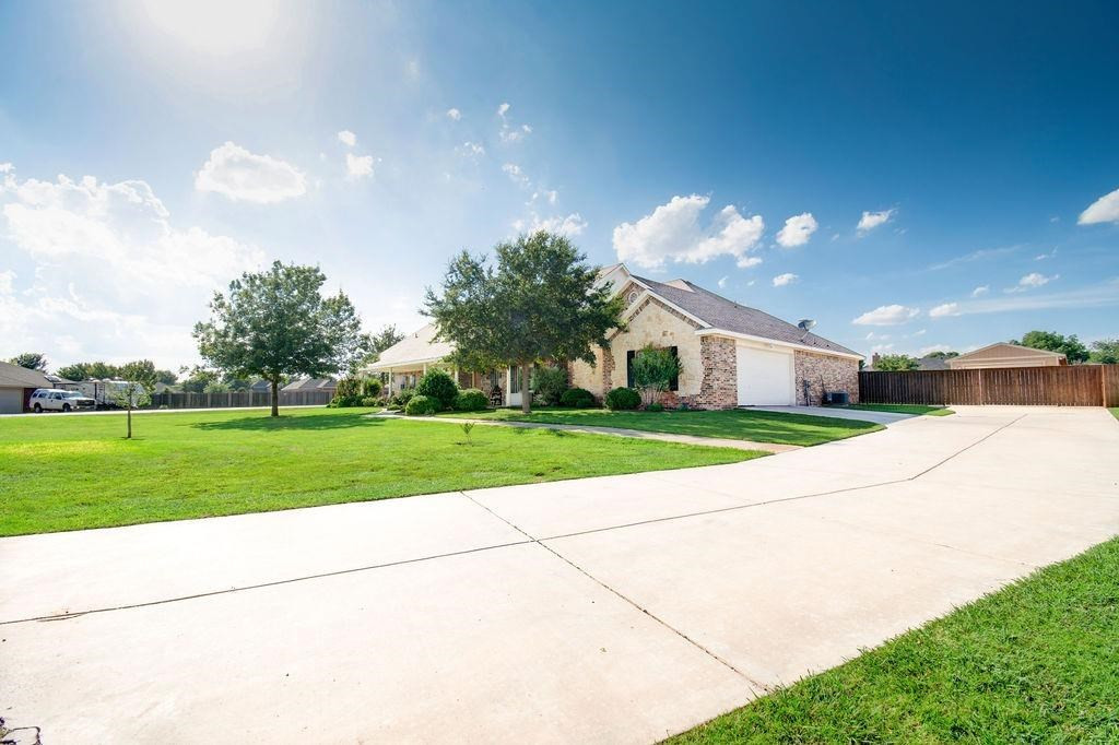 6506 15th Drive Lubbock, TX 79416 - Photo 41 of 42 a house view with a garden space