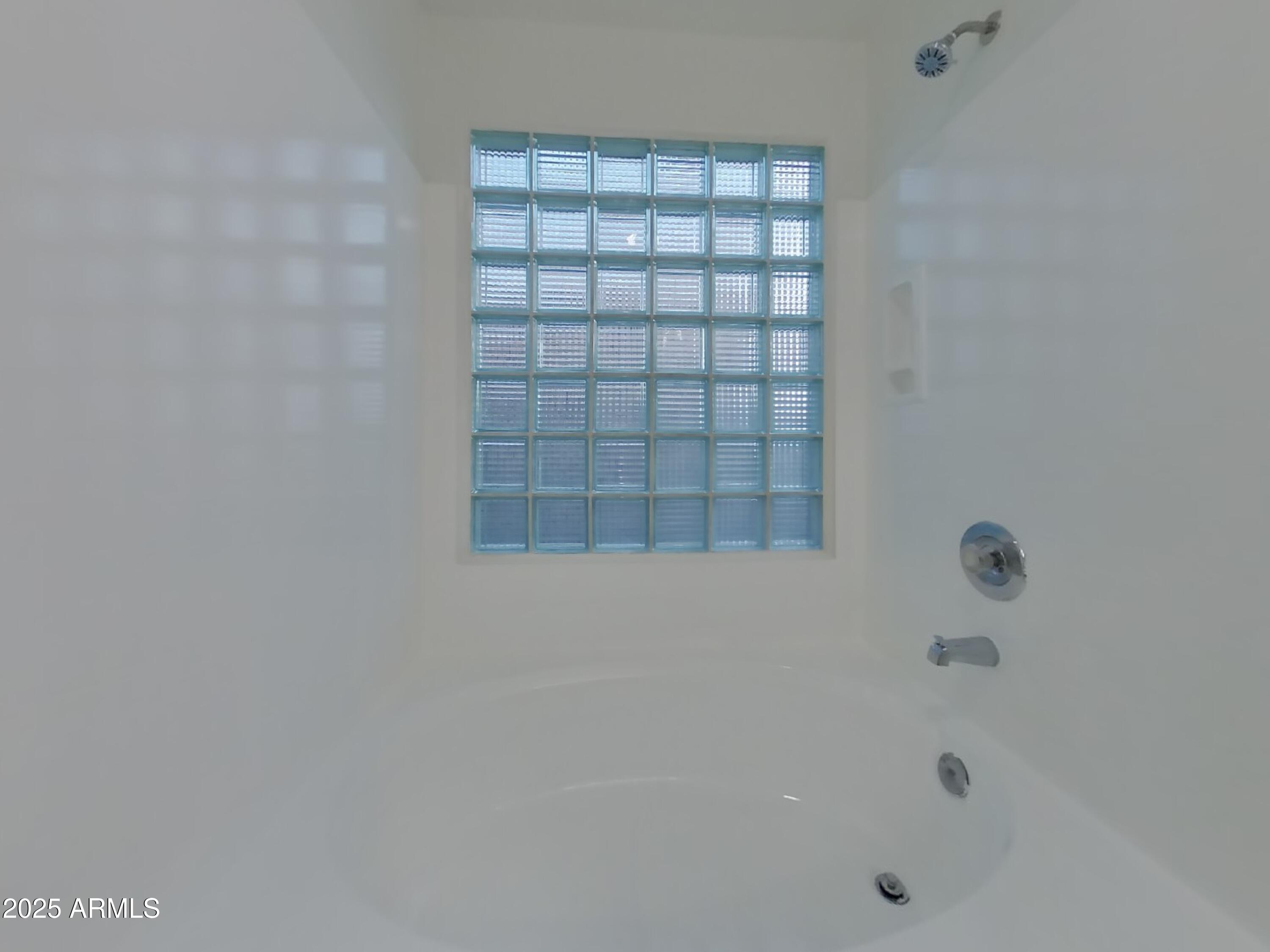 7455 East McLellan Road Mesa, AZ 85207 - Photo 9 of 16 a bathroom with a shower