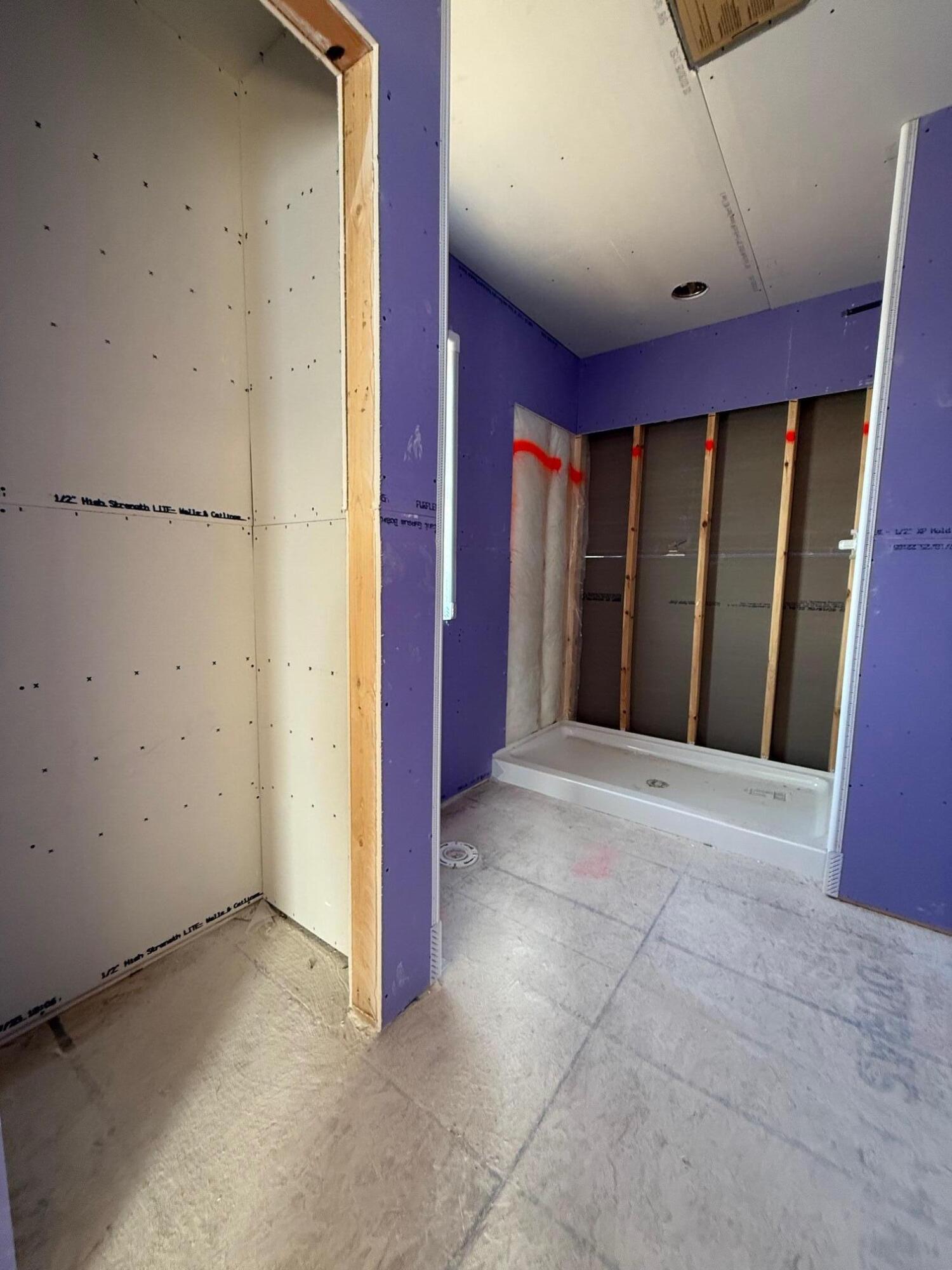 1019 Waterstone Court Pewaukee, WI 53072 - Photo 18 of 21 Primary bathroom with linen closet