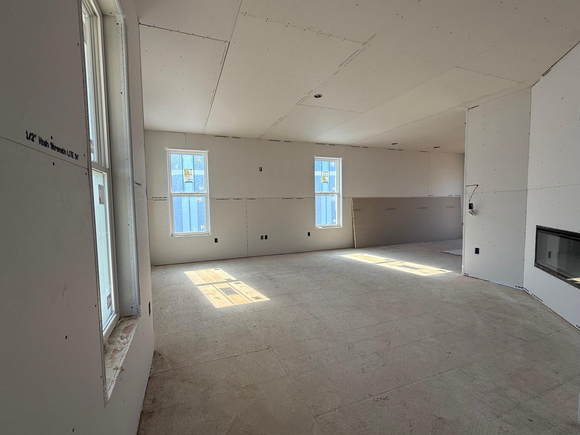1019 Waterstone Court Pewaukee, WI 53072 - Photo 4 of 21 Livingroom with fireplace