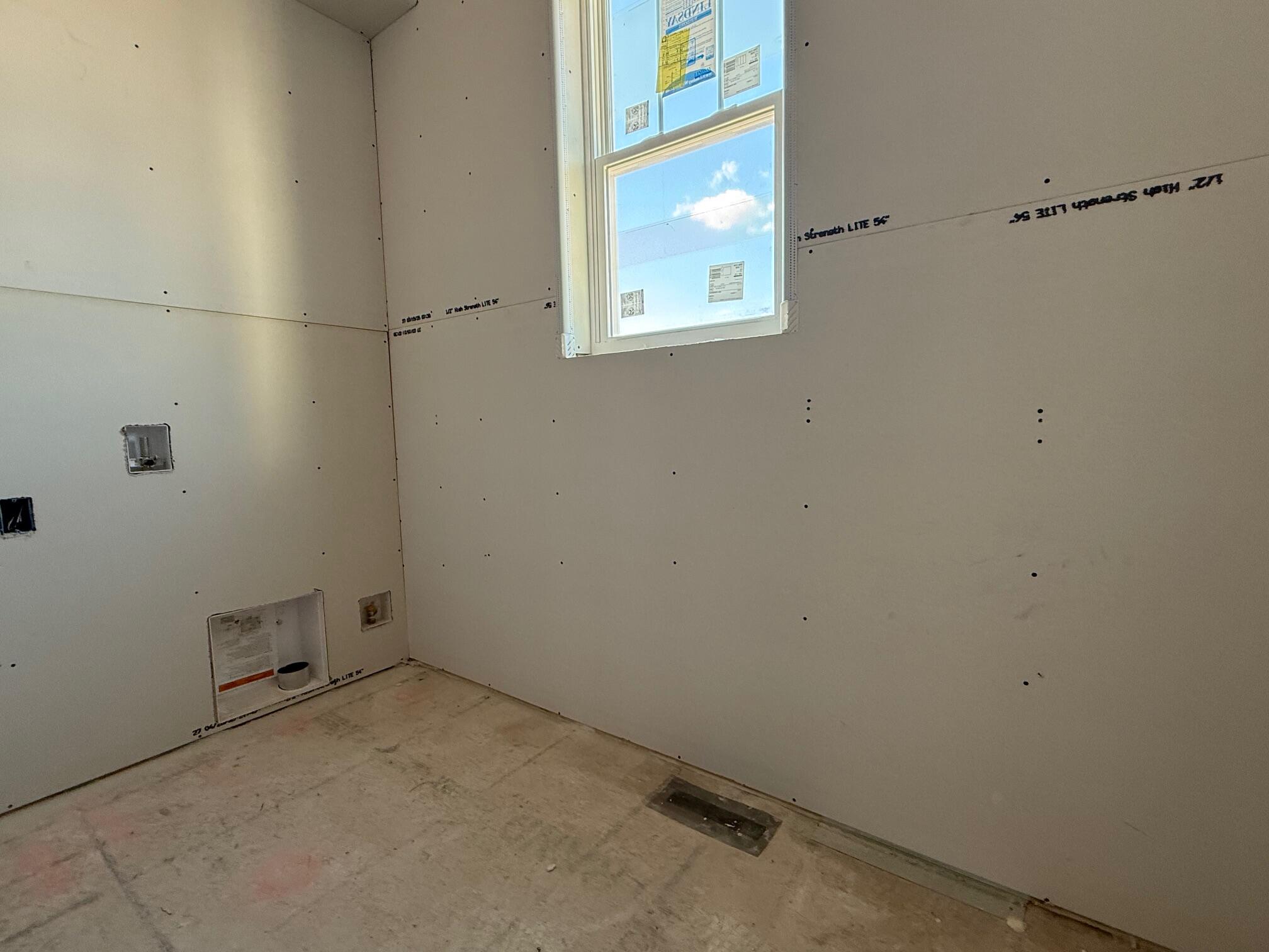 1019 Waterstone Court Pewaukee, WI 53072 - Photo 8 of 21 Laundry area