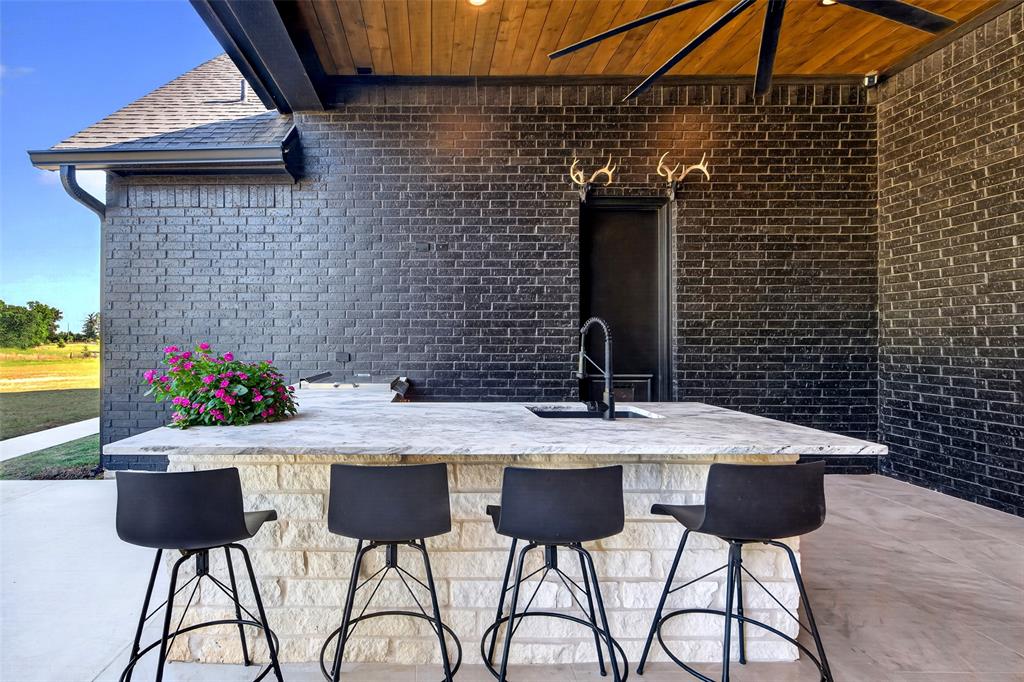 2804 Buchanan Road Hallsville, TX 75650 - Photo 35 of 40 a view of a patio with table and chairs