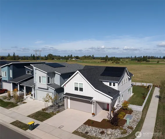 a view of a house with a ocean view