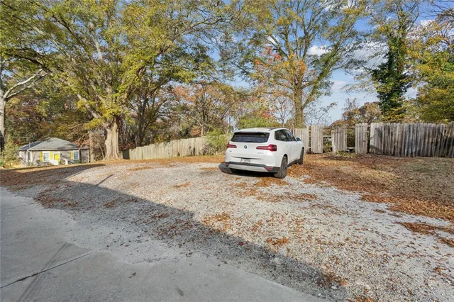 a car parked in front of a house