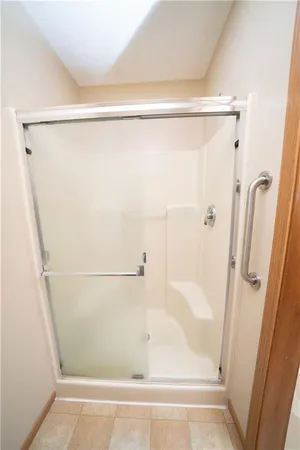 a view of a living room and entryway with wooden floor