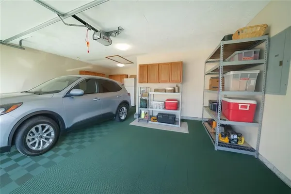 a balcony view with a black gate