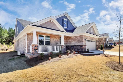 a view of a house with entertaining space