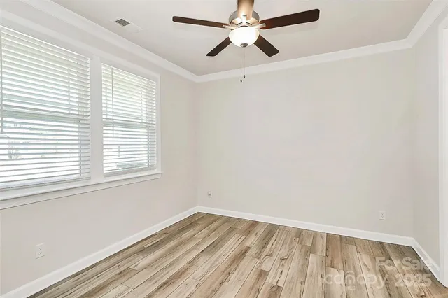 a bathroom with a toilet and a bathtub