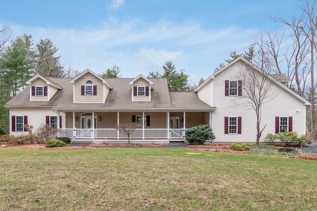 197 Dow Road Hollis, NH 03049 - Photo 1 of 38 a front view of a house with garden