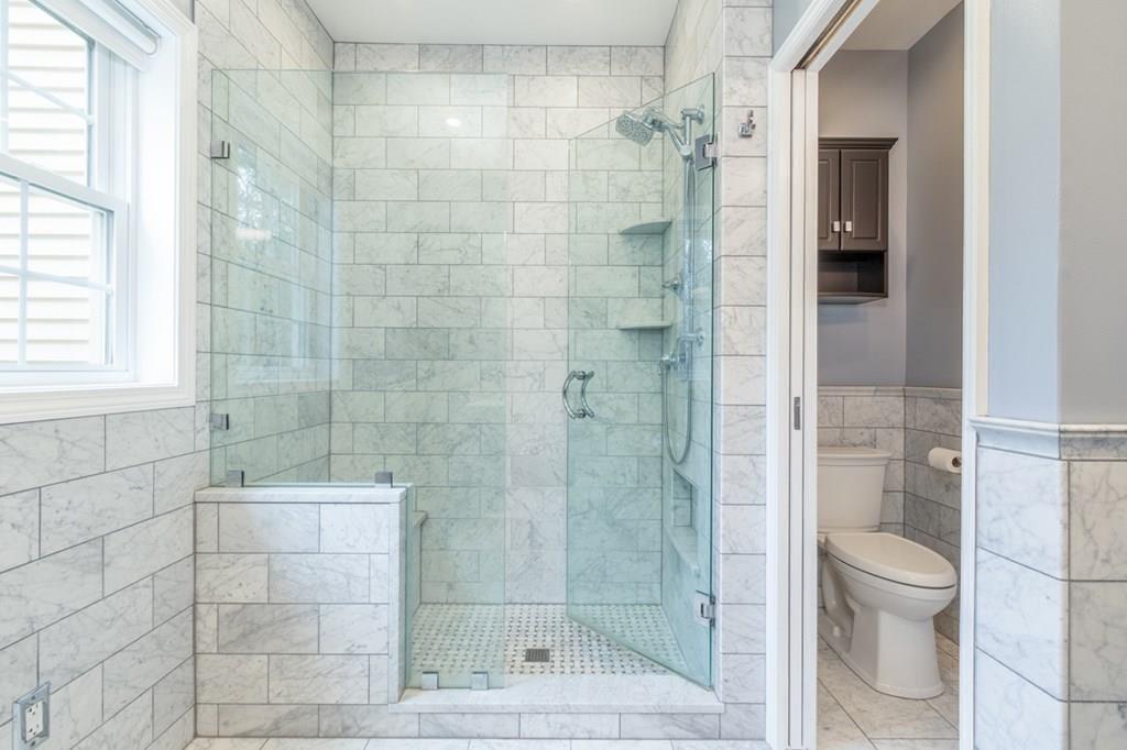 197 Dow Road Hollis, NH 03049 - Photo 16 of 38 a bathroom with a shower and a toilet