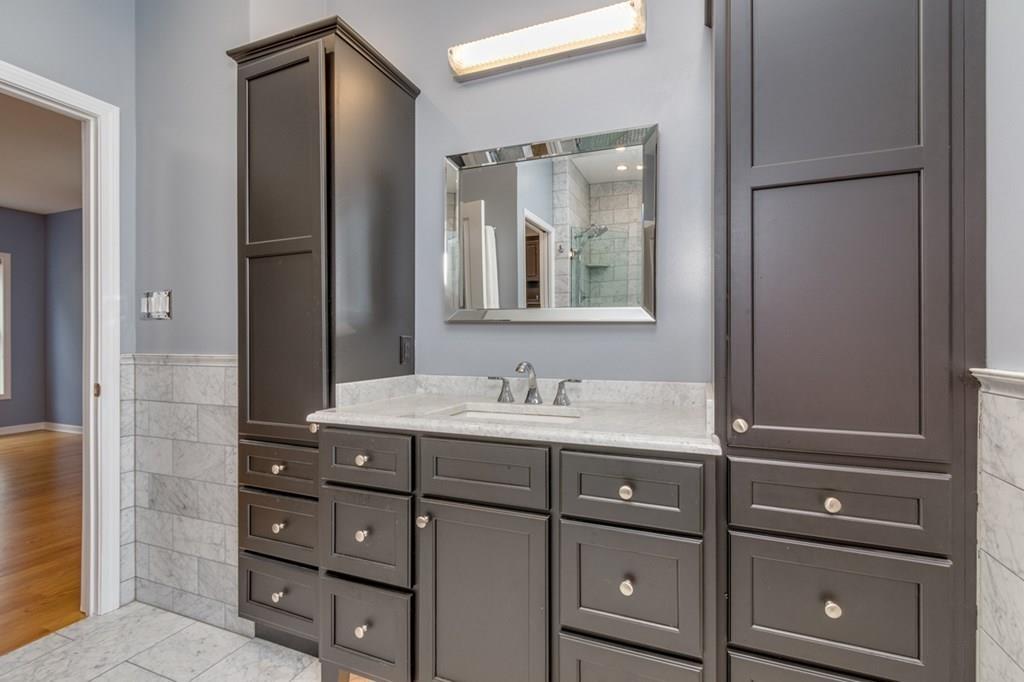 197 Dow Road Hollis, NH 03049 - Photo 17 of 38 a bathroom with a granite countertop sink and a mirror