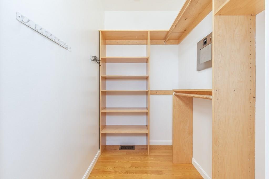 197 Dow Road Hollis, NH 03049 - Photo 18 of 38 a view of walk in closet with empty racks