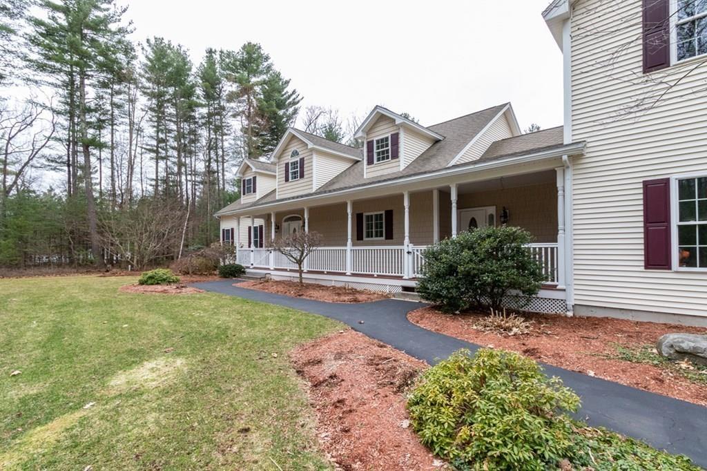 197 Dow Road Hollis, NH 03049 - Photo 2 of 38 a front view of a house with garden
