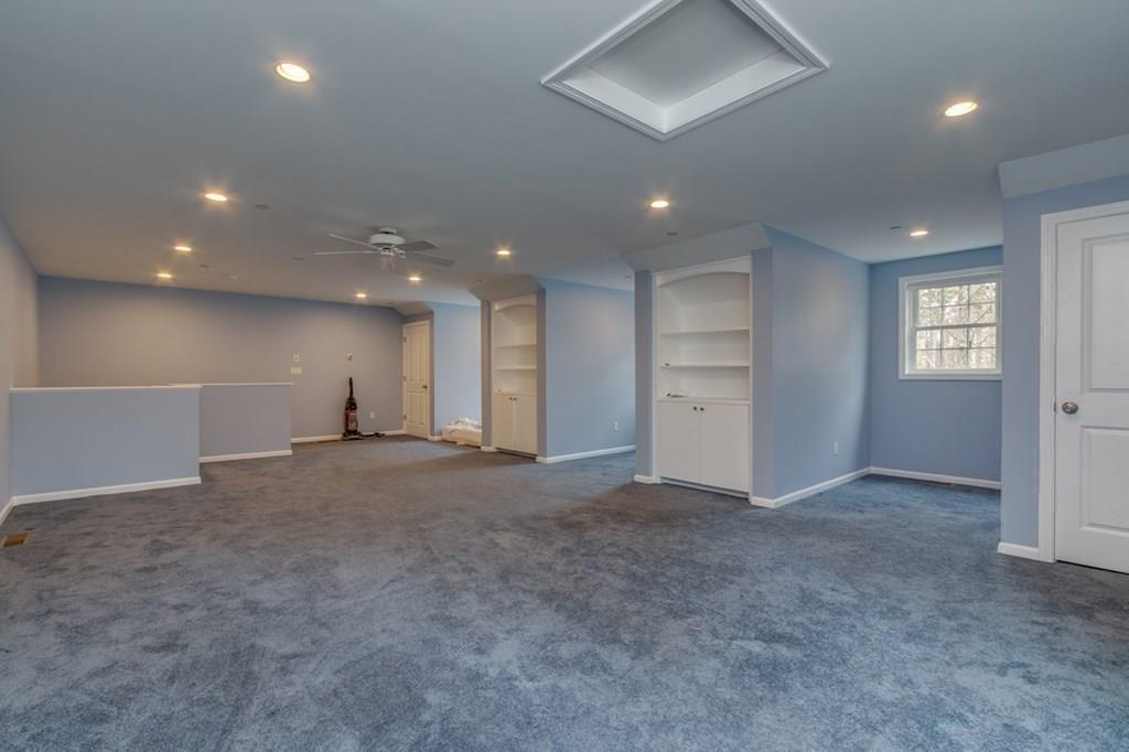 197 Dow Road Hollis, NH 03049 - Photo 21 of 38 a view of an empty room and a window