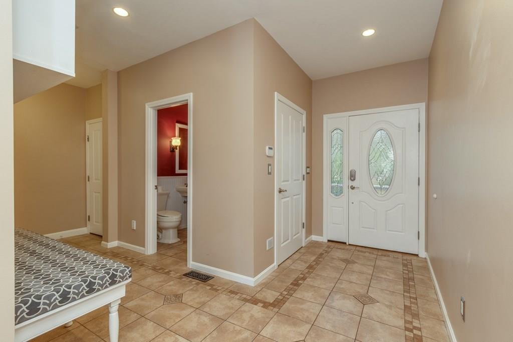 197 Dow Road Hollis, NH 03049 - Photo 22 of 38 a view of a hallway with wooden shelves