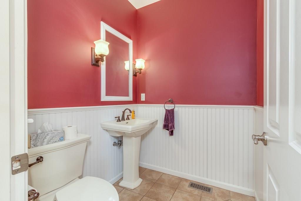 197 Dow Road Hollis, NH 03049 - Photo 23 of 38 a bathroom with a sink mirror toilet and shower