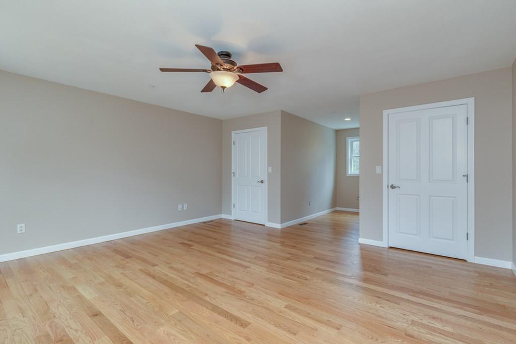 197 Dow Road Hollis, NH 03049 - Photo 31 of 38 a view of an empty room and wooden floor