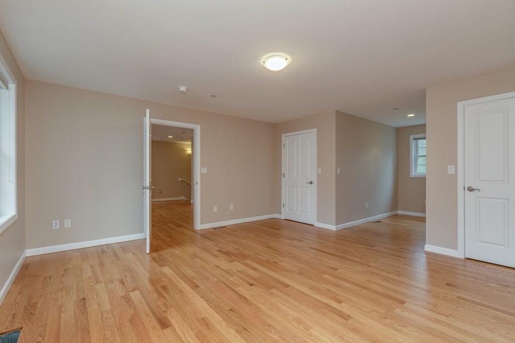 197 Dow Road Hollis, NH 03049 - Photo 33 of 38 a view of an empty room with wooden floor and closet