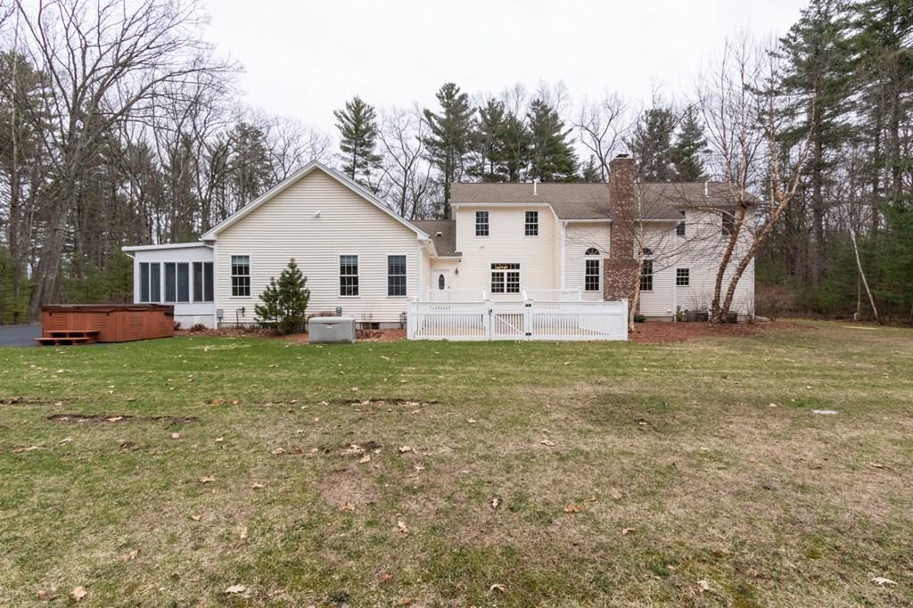 197 Dow Road Hollis, NH 03049 - Photo 37 of 38 a front view of a house with garden