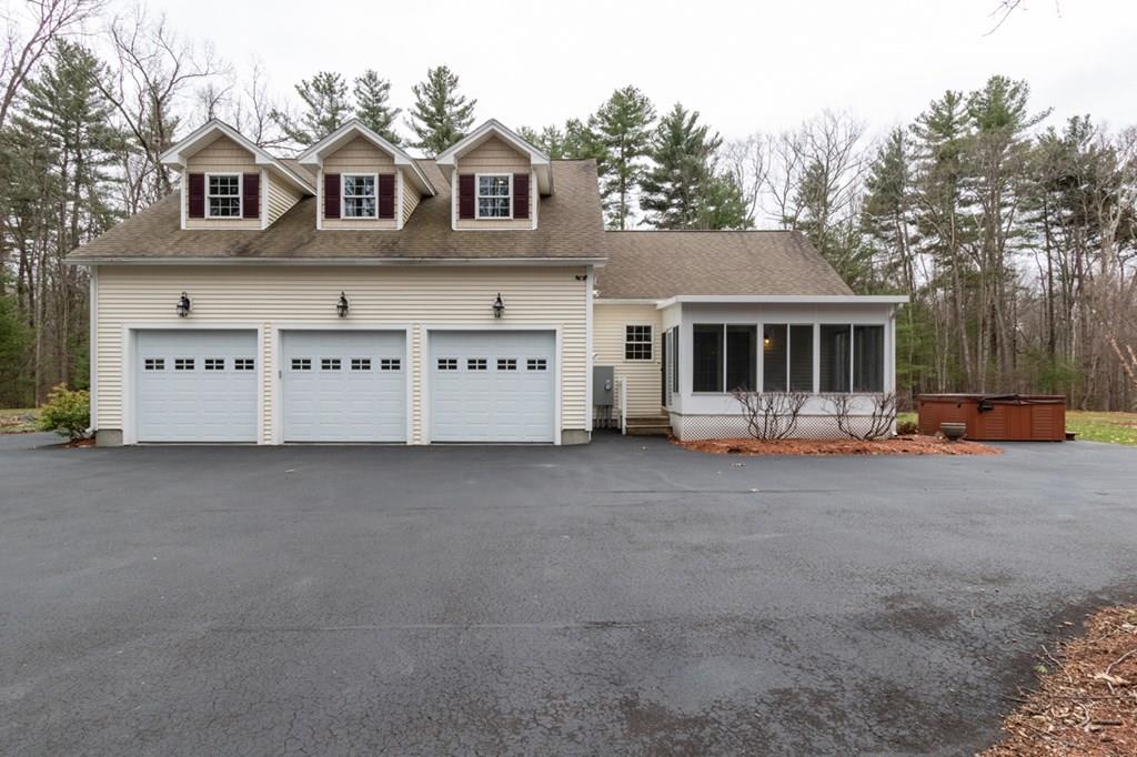 197 Dow Road Hollis, NH 03049 - Photo 38 of 38 a view of a house with a yard and sitting area
