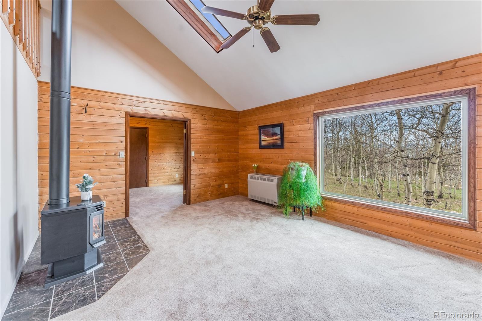 308 Rangeview Drive Black Hawk, CO 80422 - Photo 7 of 26 a view of a livingroom with furniture and a window