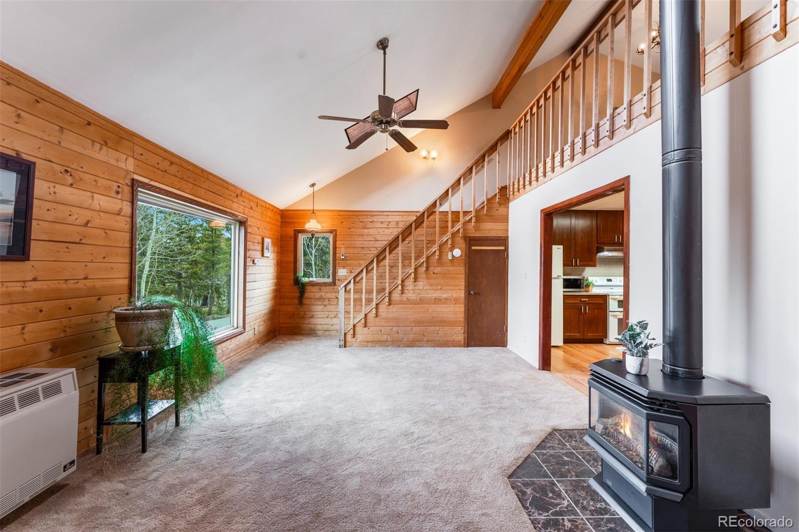 308 Rangeview Drive Black Hawk, CO 80422 - Photo 8 of 26 a view of a porch with a table and chairs