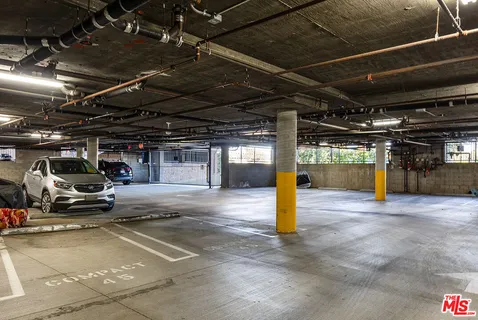 a view of parking garage with a garage