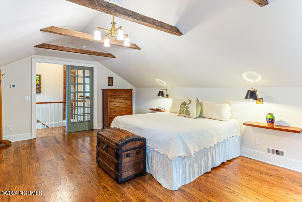 180 North Ridge Street Southern Pines, NC 28387 - Photo 60 of 72 Exposed beams and built-in closets.