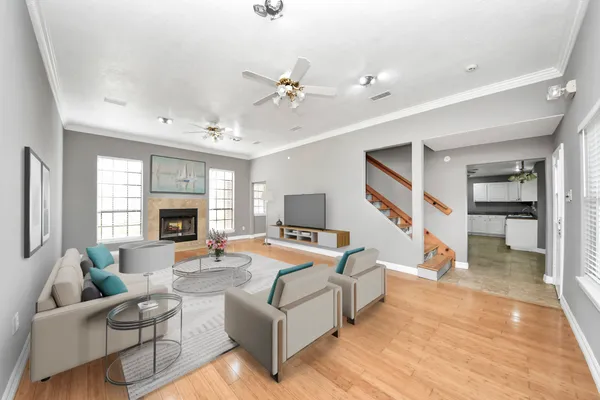 a spacious bedroom with a large bed and a flat screen tv