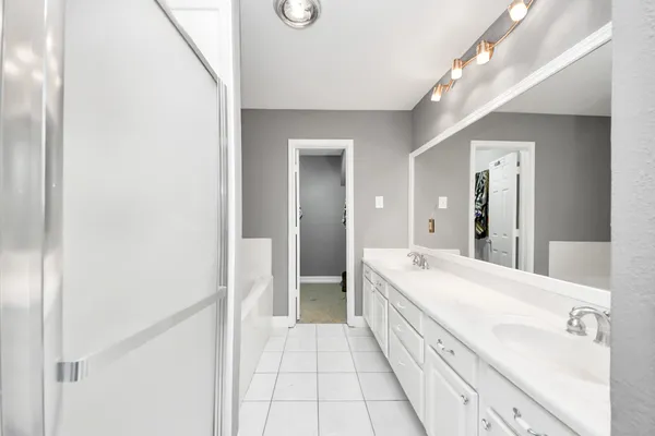 a view of grassy field with benches