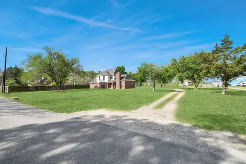 a house view with a garden space