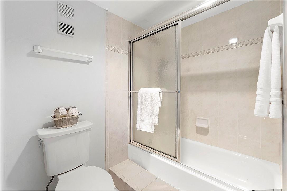 6100 Northwest 2nd Avenue, Unit 321 Boca Raton, FL 33487 - Photo 19 of 27 a bathroom with a sink toilet and shower