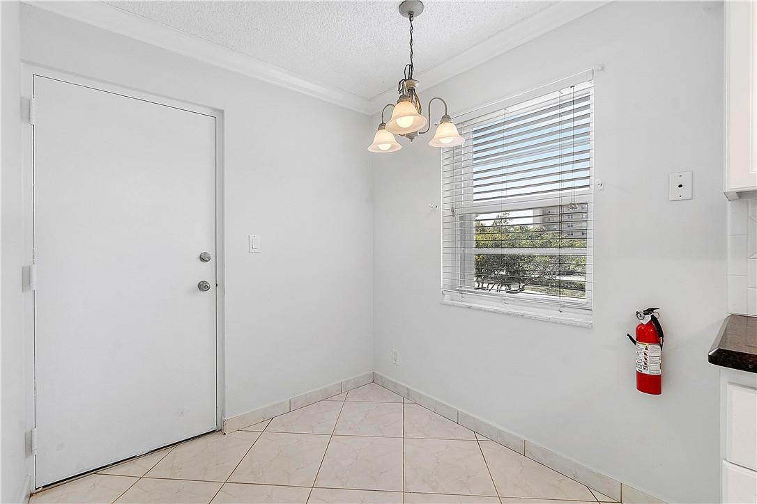 6100 Northwest 2nd Avenue, Unit 321 Boca Raton, FL 33487 - Photo 9 of 27 a bathroom with a window and a shower