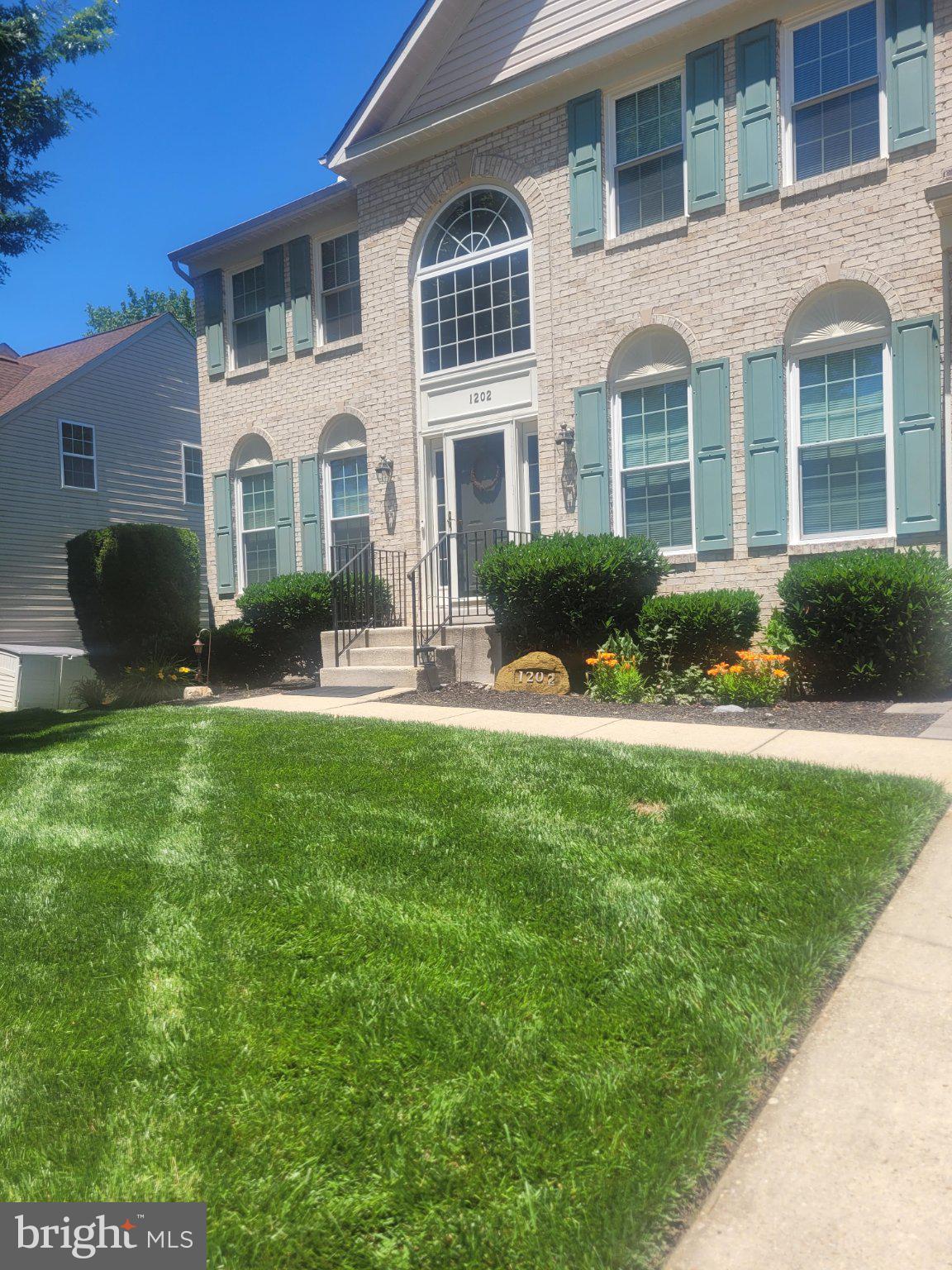 1202 Strausberg Street Accokeek, MD 20607 - Photo 5 of 43 Charming home with lush green lawn.