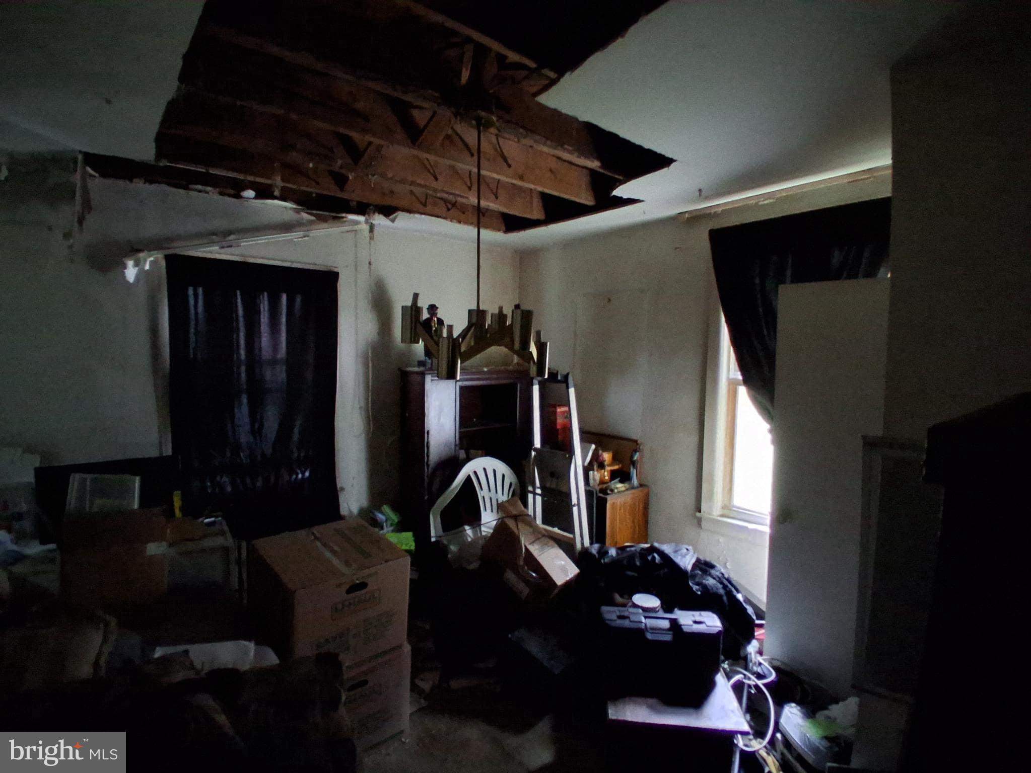 4035 Cedardale Road Baltimore, MD 21215 - Photo 11 of 40 a front view of a house with entryway