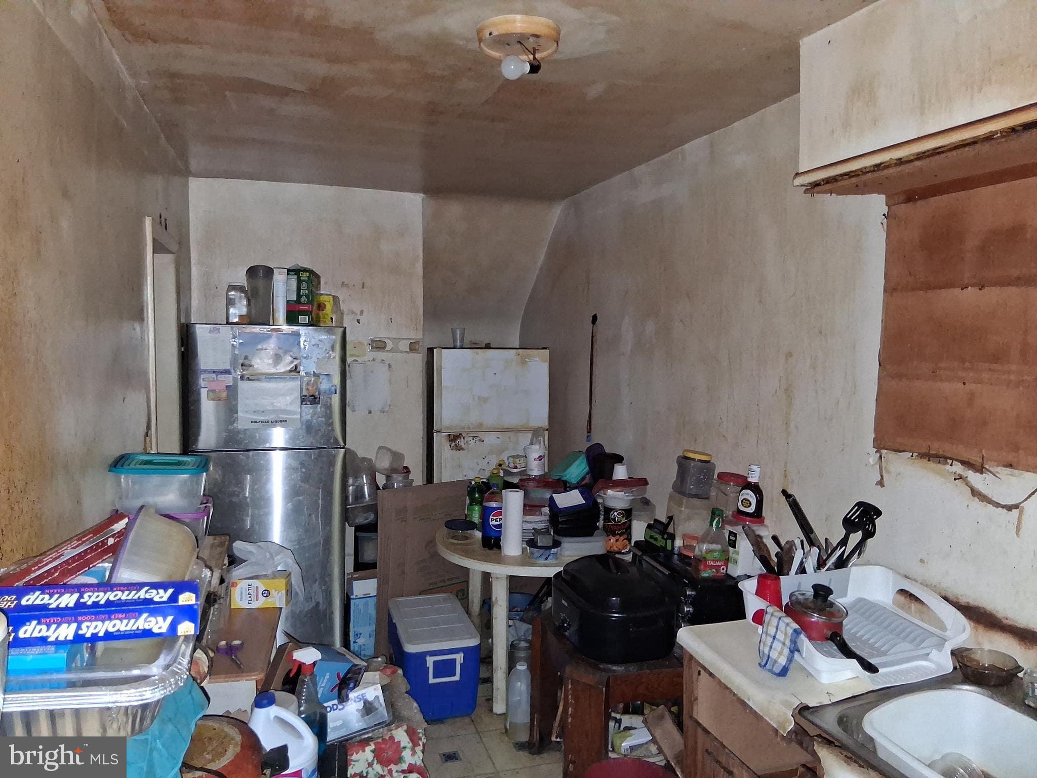 4035 Cedardale Road Baltimore, MD 21215 - Photo 17 of 40 a room with storage and utility