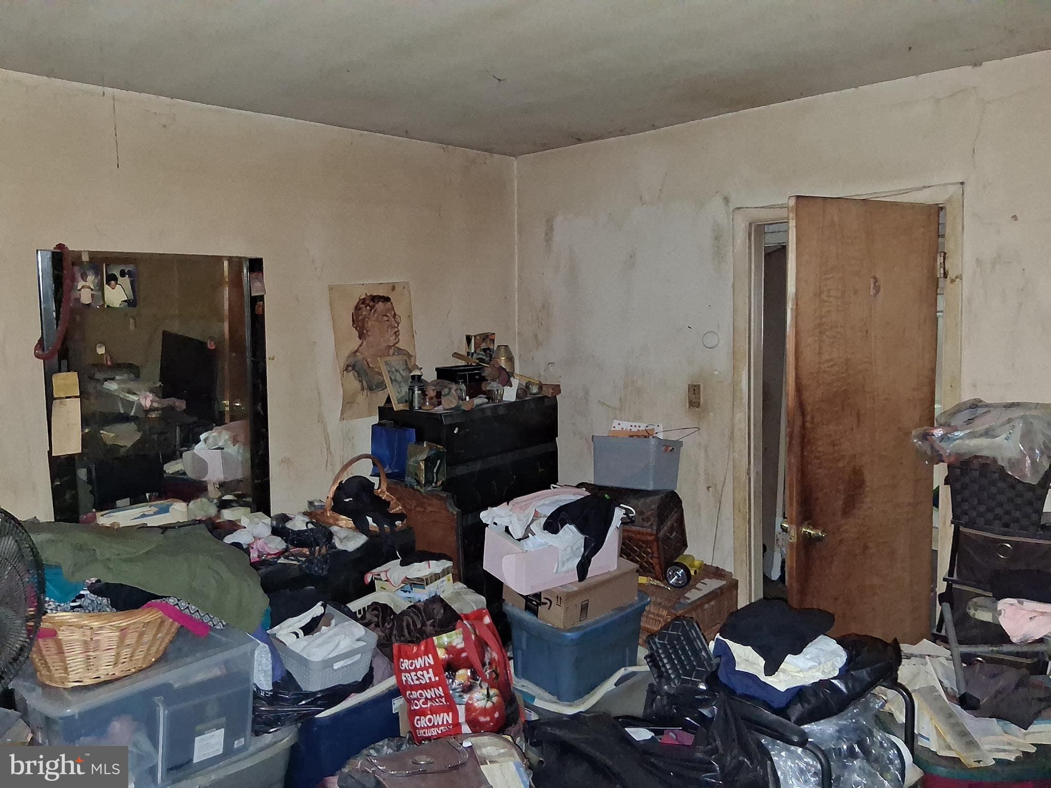 4035 Cedardale Road Baltimore, MD 21215 - Photo 24 of 40 a room with furniture a rug and gym equipment