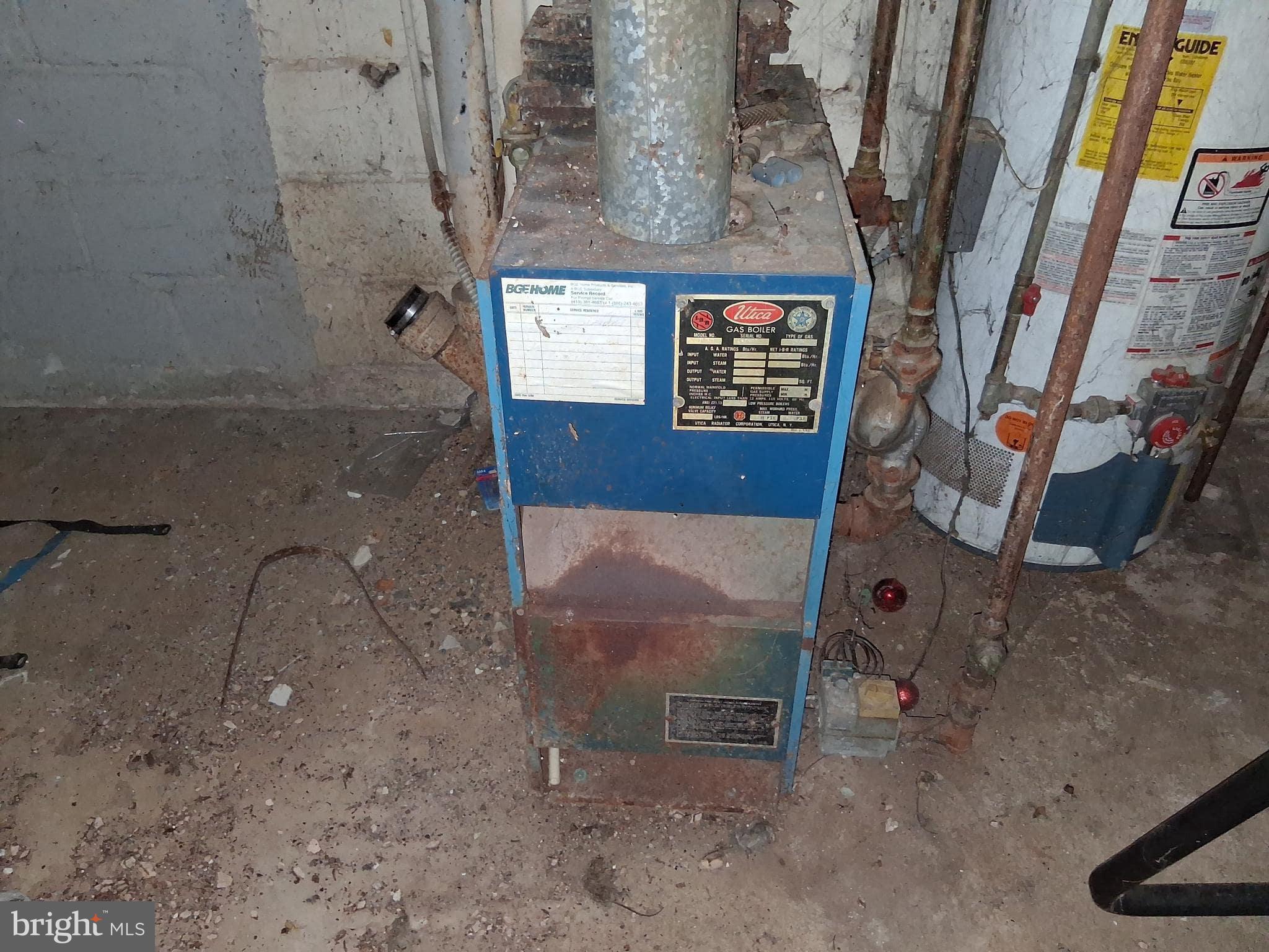 4035 Cedardale Road Baltimore, MD 21215 - Photo 34 of 40 a bathroom with a sink and a shower