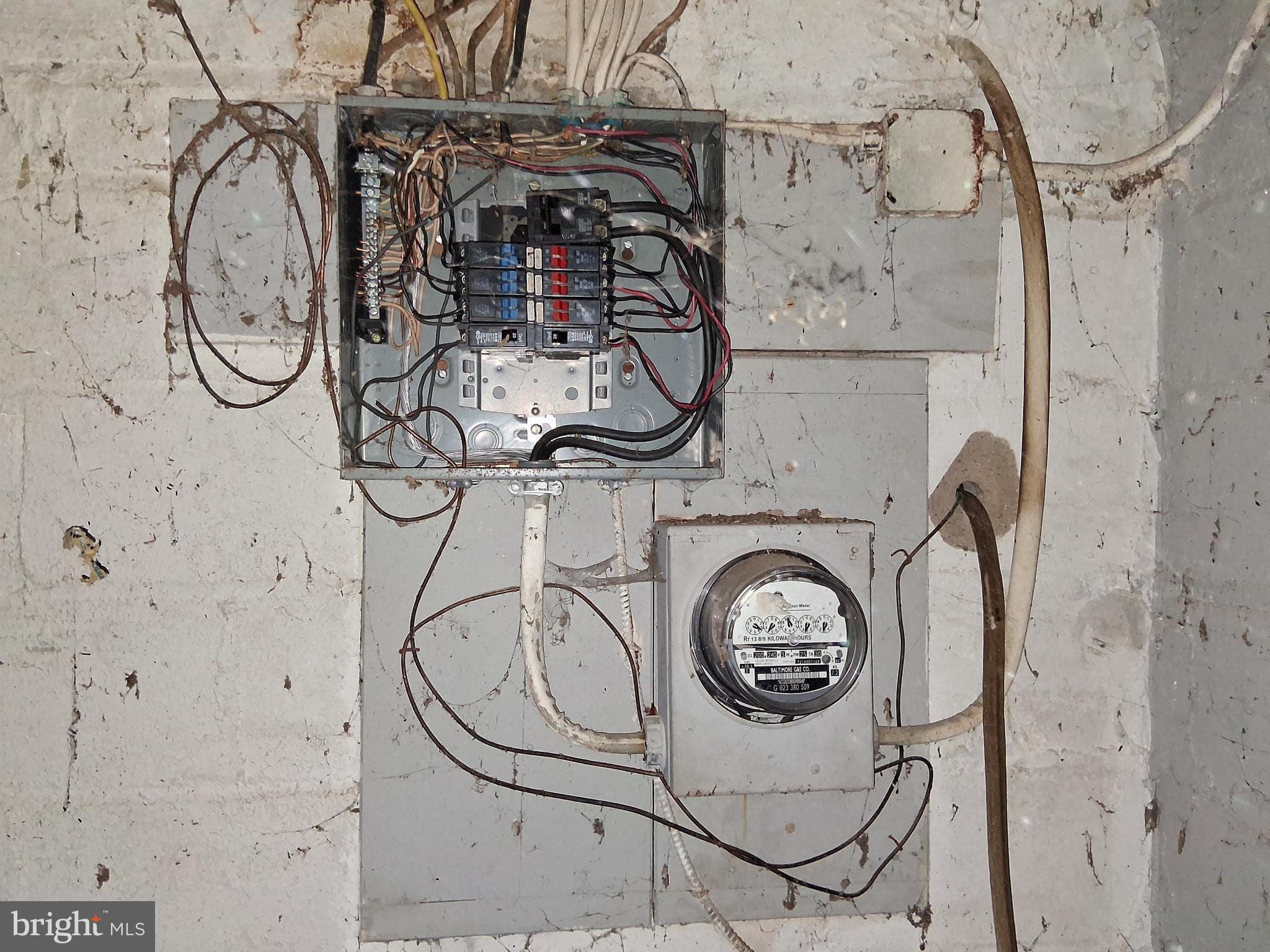 4035 Cedardale Road Baltimore, MD 21215 - Photo 36 of 40 a bathroom with a sink and a mirror