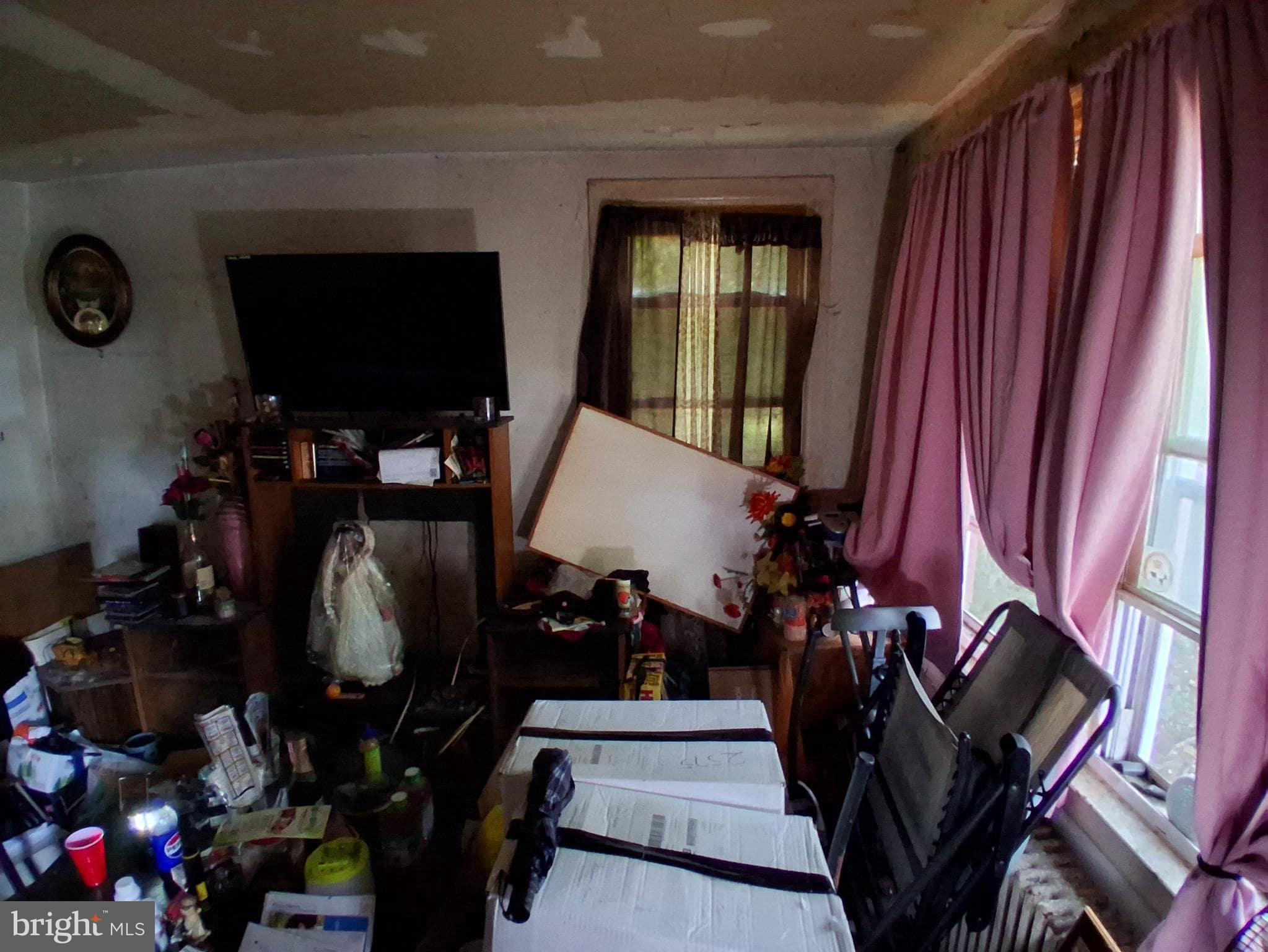 4035 Cedardale Road Baltimore, MD 21215 - Photo 6 of 40 a view of a room with gym equipment