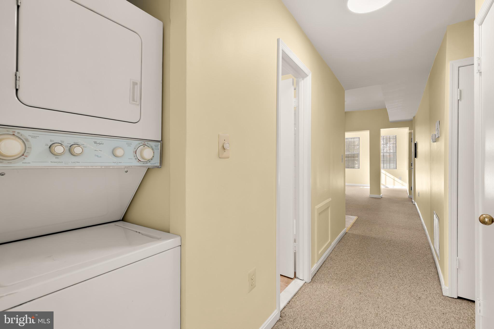 1768 Florida Avenue Northwest, Unit 1 Washington, DC 20009 - Photo 11 of 19 a view of a hallway with washer and dryer