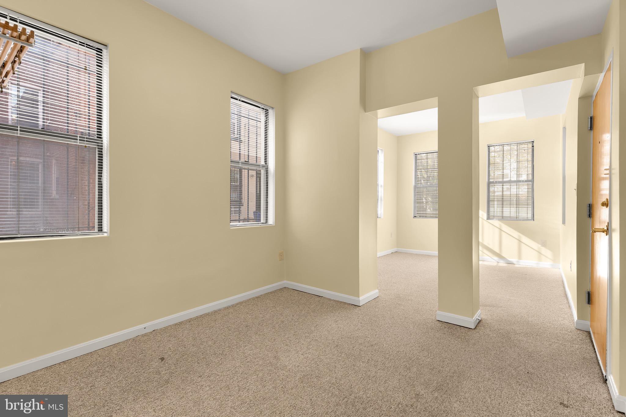1768 Florida Avenue Northwest, Unit 1 Washington, DC 20009 - Photo 3 of 19 a view of an empty room with glass door