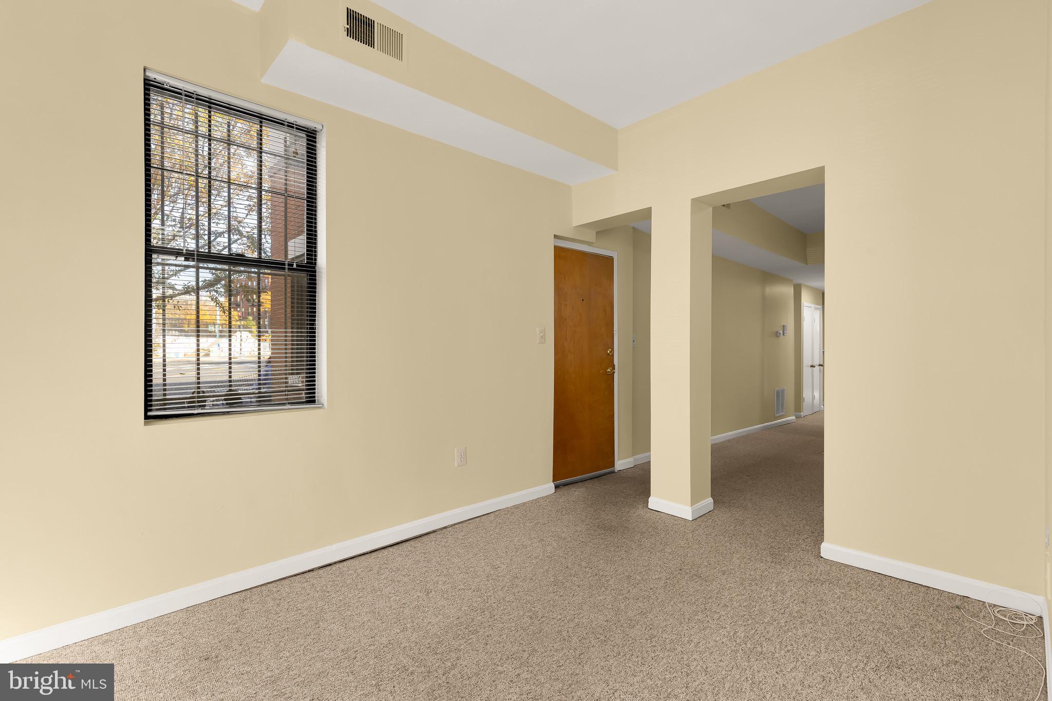 1768 Florida Avenue Northwest, Unit 1 Washington, DC 20009 - Photo 7 of 19 a view of an empty room with a window
